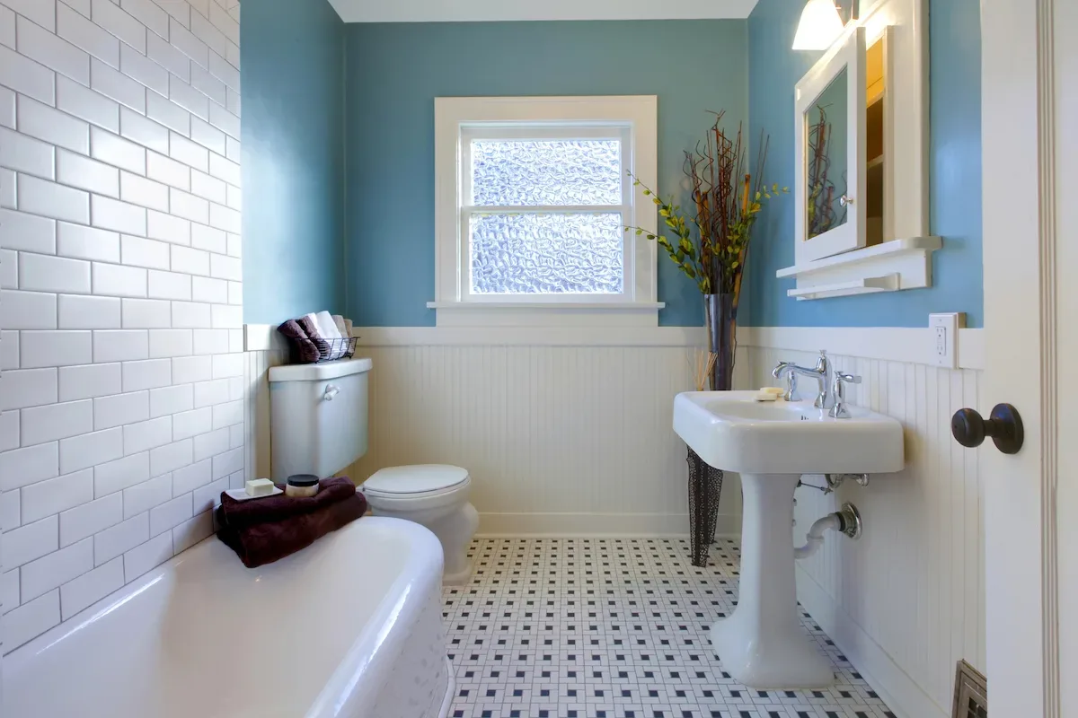 Bathroom renovation with classic tiling and pedestal sink