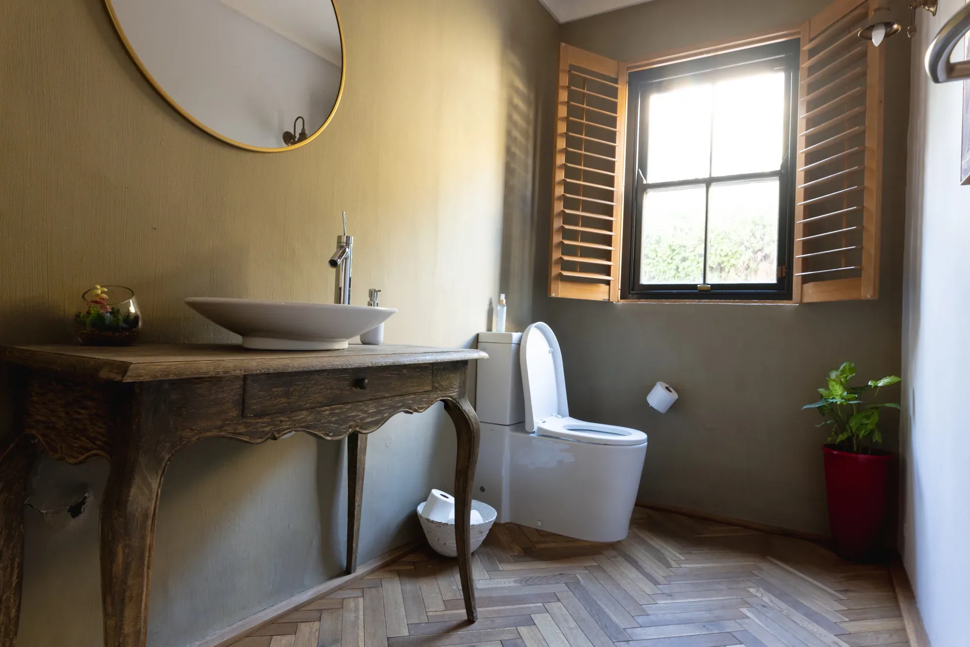 Renovated powder room with pedestal basin and fresh finishes